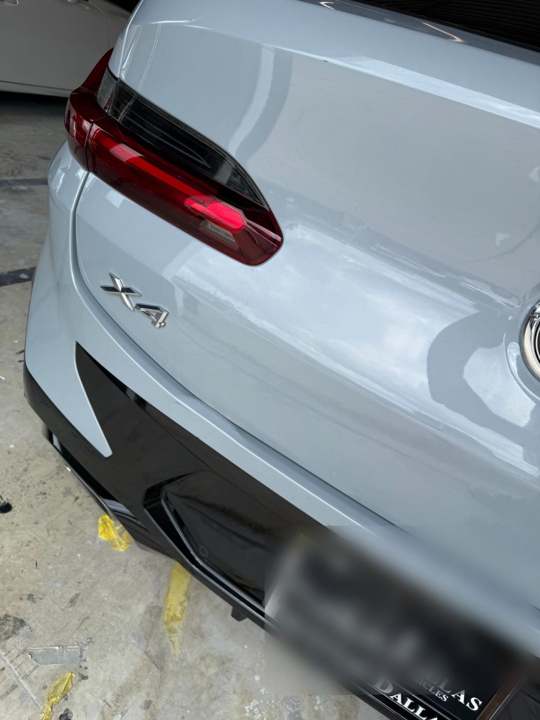 BMW X4 rear quarter straight and refinished after bodywork in the booth